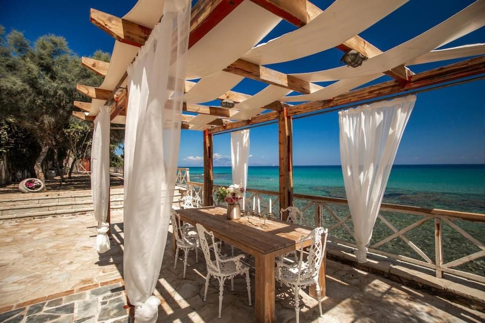 Patio, Day, View (from property/room), Dining area, Beach, Sea view