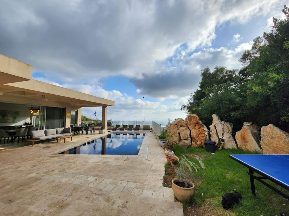Property building, Natural landscape, Garden, Pool view, sunbed