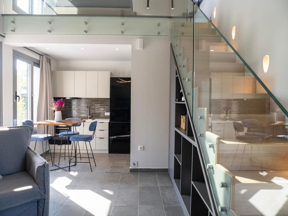 Kitchen or kitchenette, Living room, Seating area, Dining area