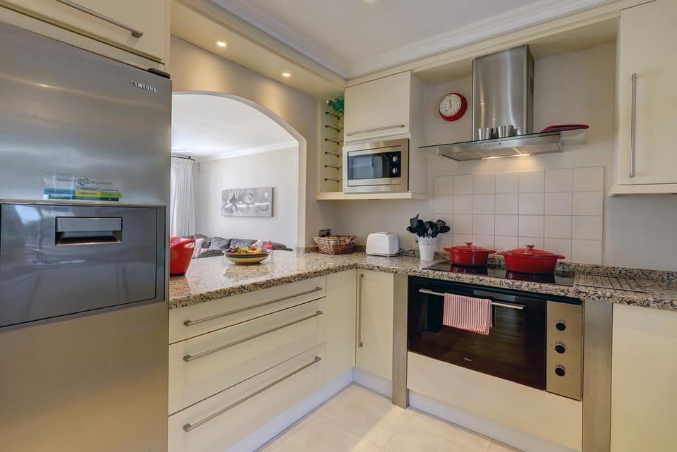 Kitchen or kitchenette, dishwasher, oven, stove, toaster