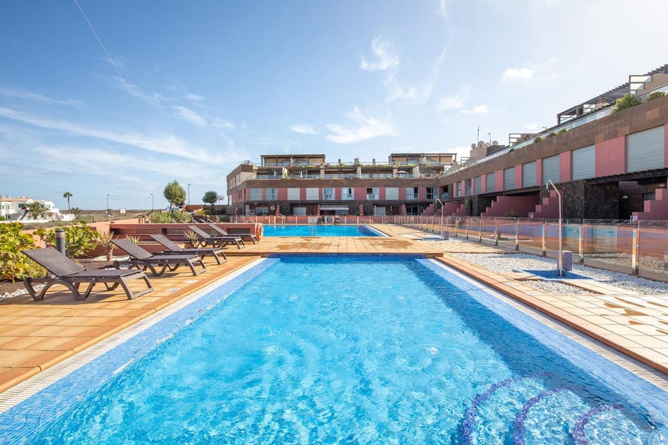 Property building, Living room, Swimming pool