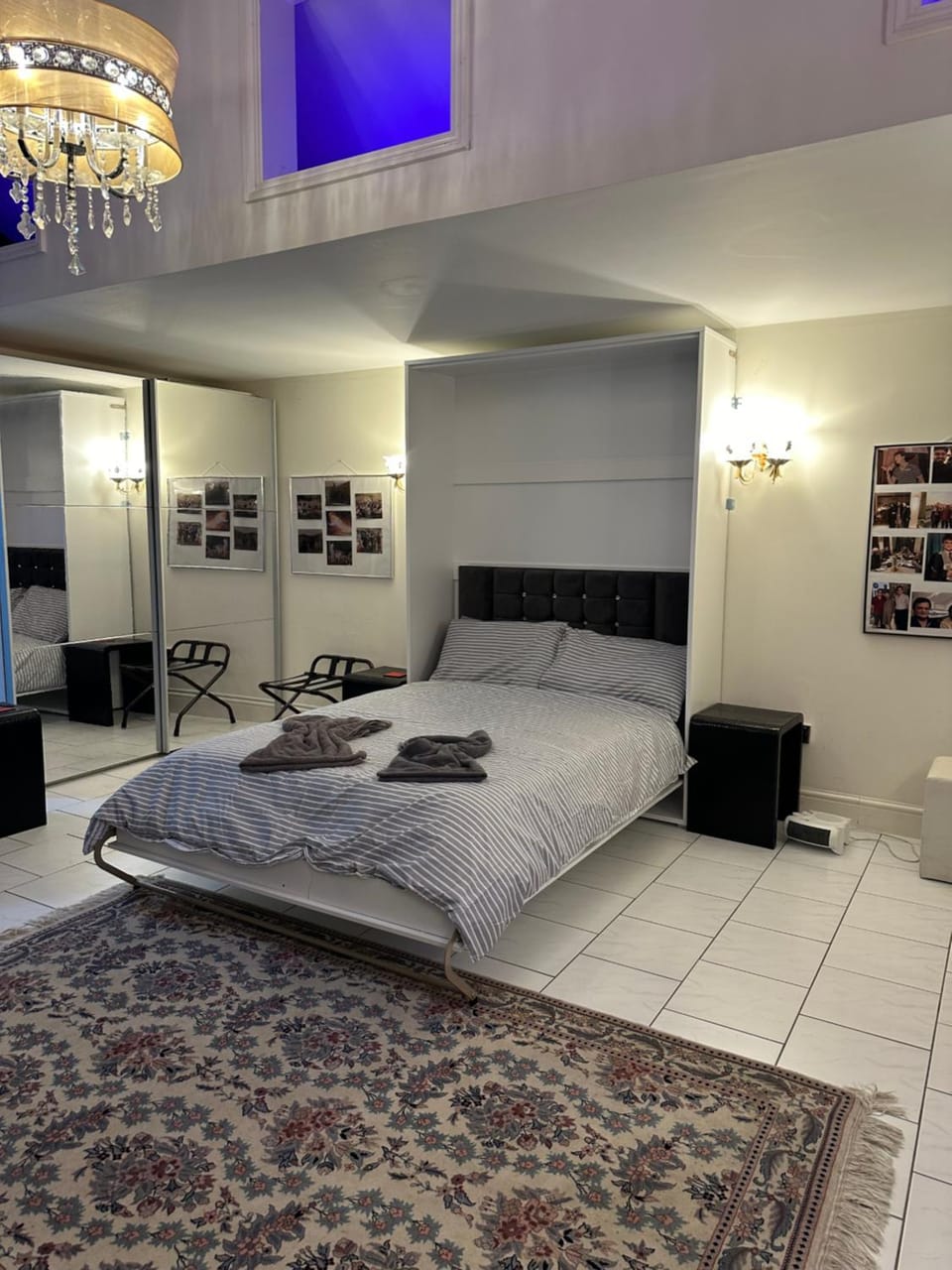Bed, towels, wardrobe