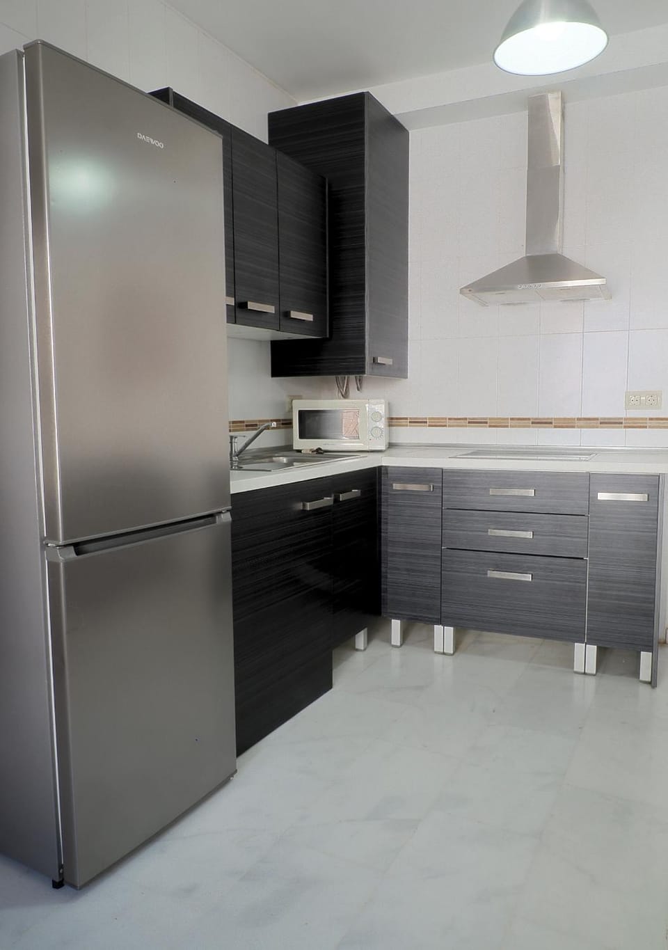 Kitchen or kitchenette, minibar, stove