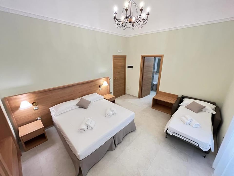 Bed, Living room, Photo of the whole room, Seating area, Bedroom, towels, wardrobe