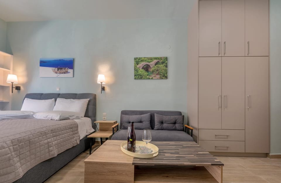 Bed, Seating area, wardrobe