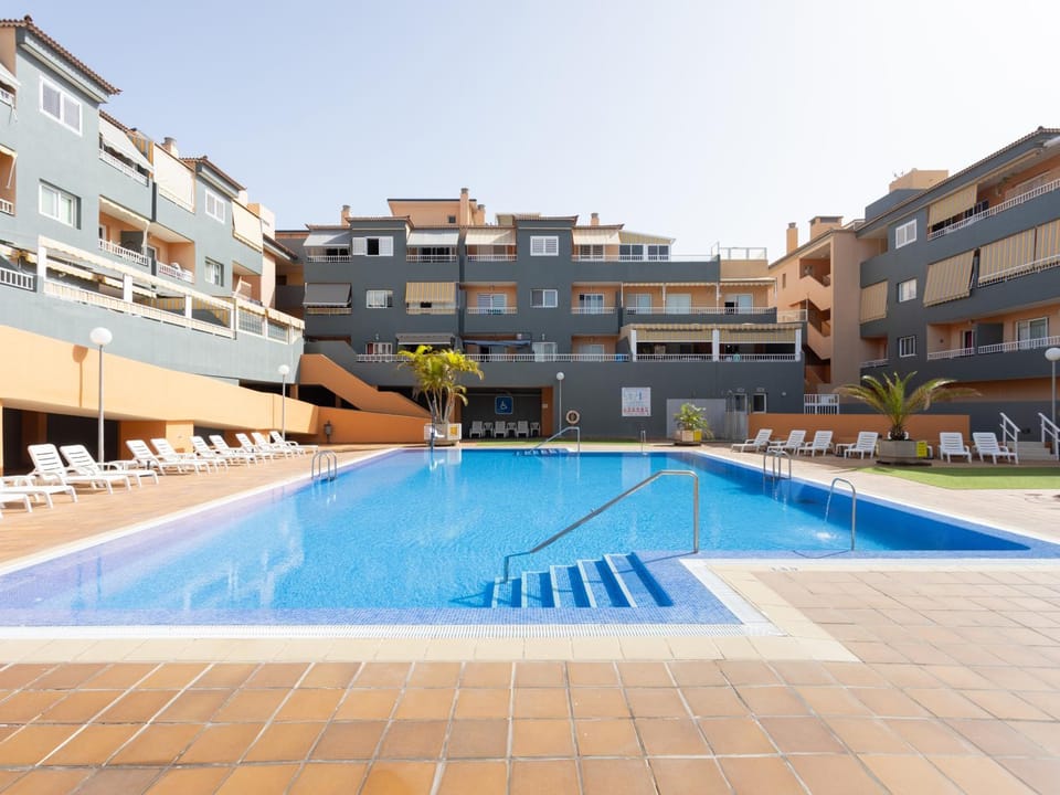 Property building, Swimming pool, Swimming pool, sunbed
