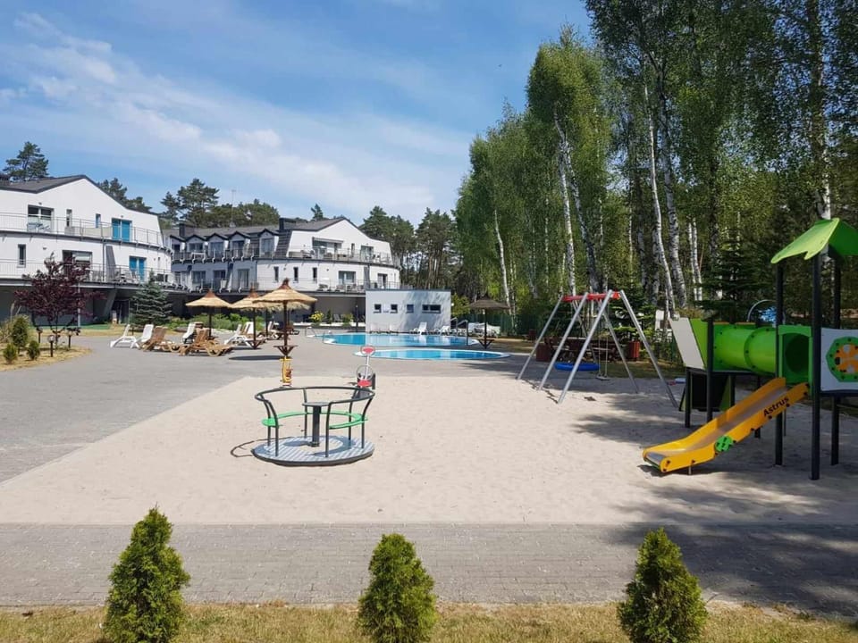 Apartament HAPPY 03 BASEN & KORT TENISOWY, OCHRONA 24h - DUŻY zielony taras !!! Apartment in West Pomeranian Voivodeship, Poland