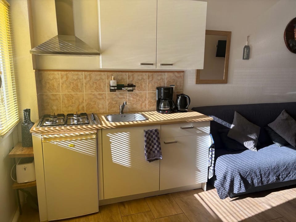 Kitchen or kitchenette, stove