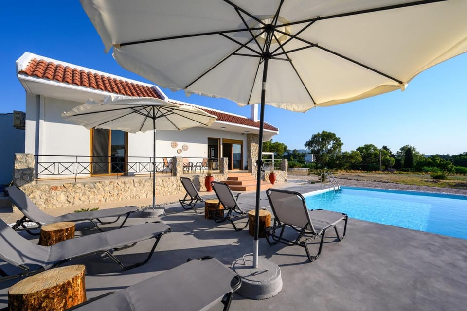 Property building, Patio, Swimming pool, sunbed