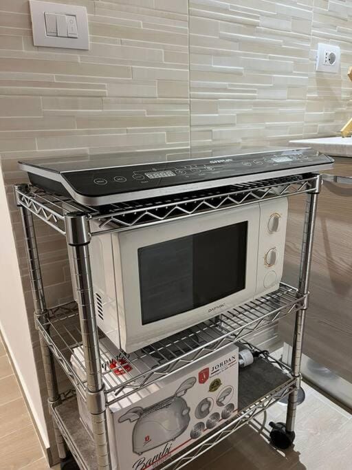 Kitchen or kitchenette, microwave