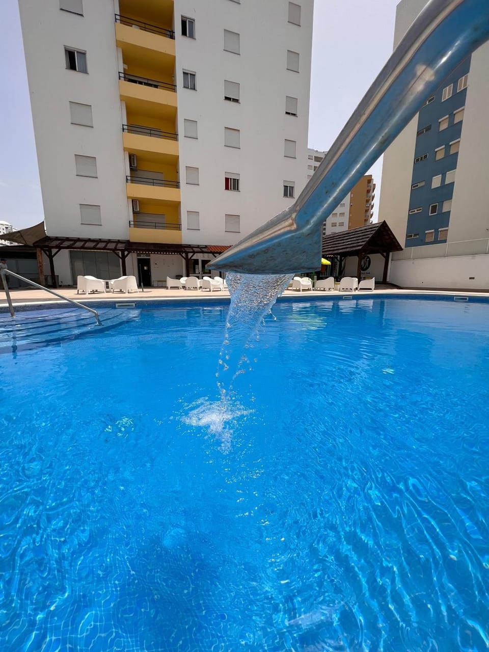 Property building, Living room, Swimming pool