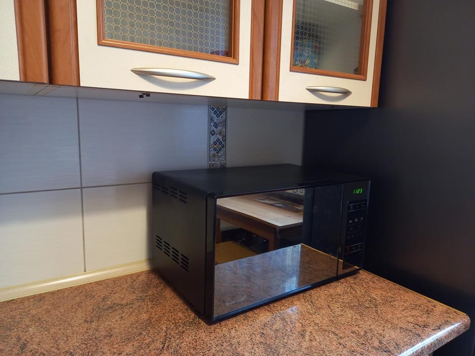 Kitchen or kitchenette, microwave