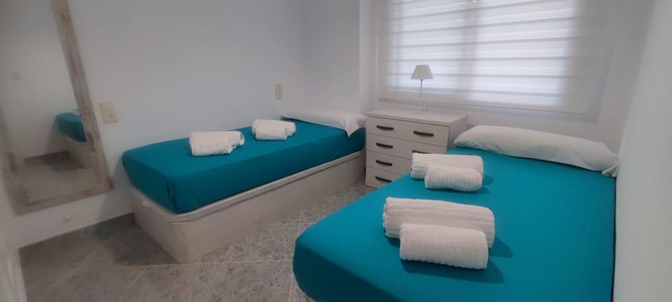 Acogedor apartamento en Daimús a 150 metros de la playa con parking privado y piscinas comunitarias Apartment in Daimús