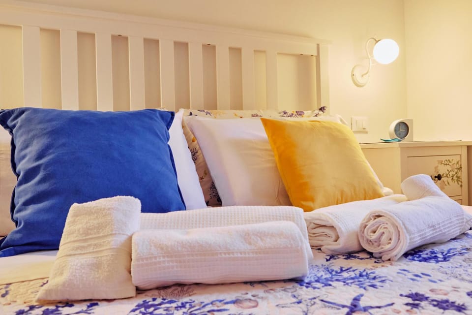 Bedroom, towels, wardrobe, air conditioner