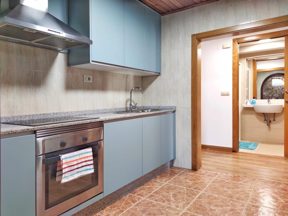 Kitchen or kitchenette, stove