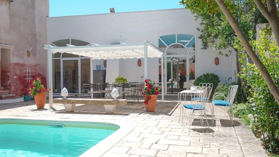 Property building, Patio, Swimming pool