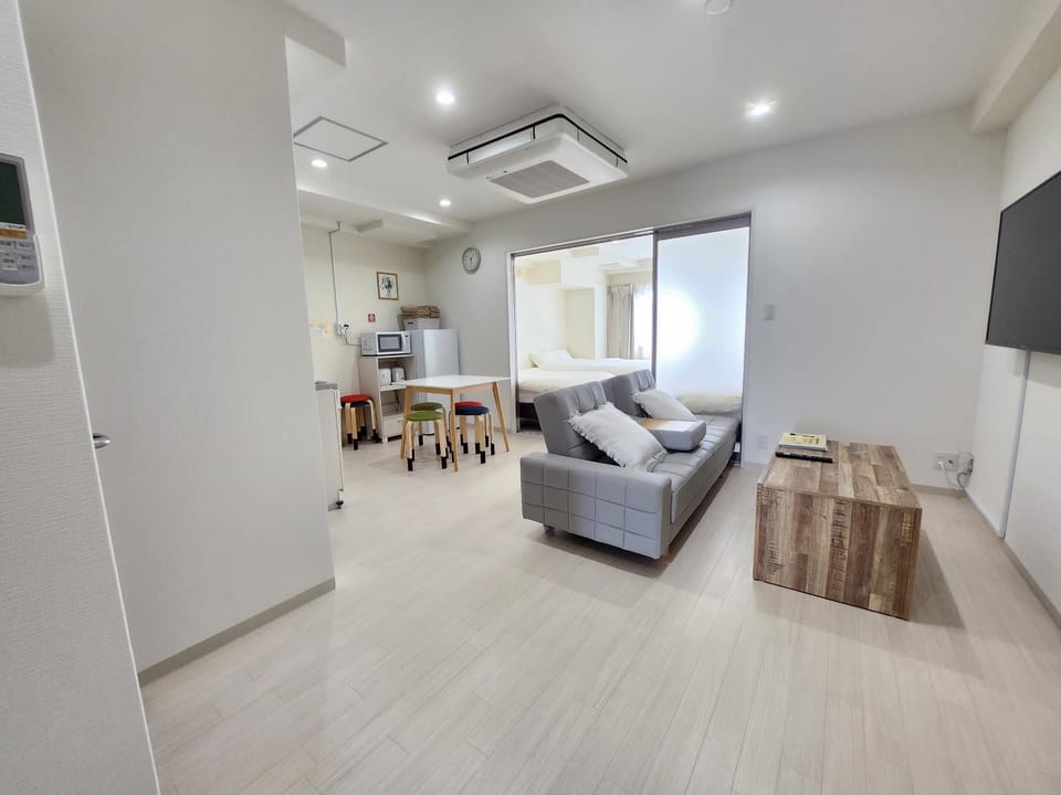 TV and multimedia, Living room, Photo of the whole room, Seating area, Dining area, air conditioner