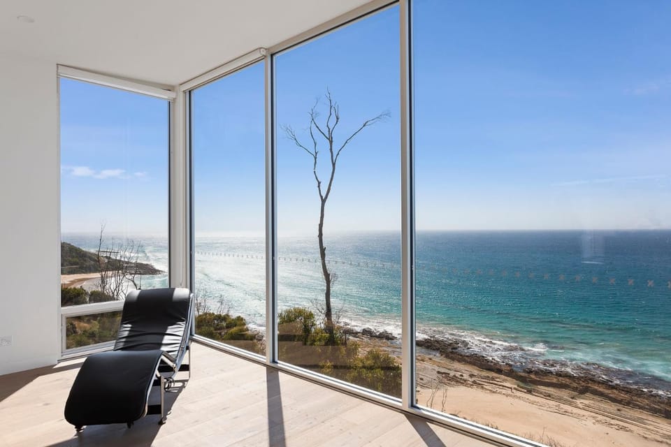 Natural landscape, View (from property/room), Living room, Seating area, Sea view