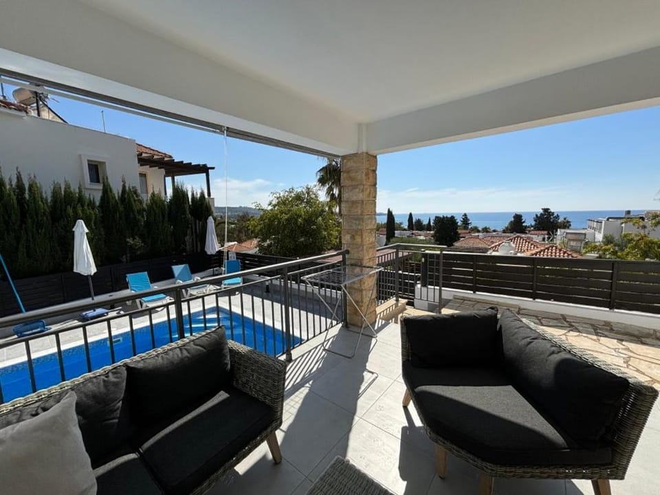 Patio, Balcony/Terrace, Seating area, Pool view, Sea view, Swimming pool