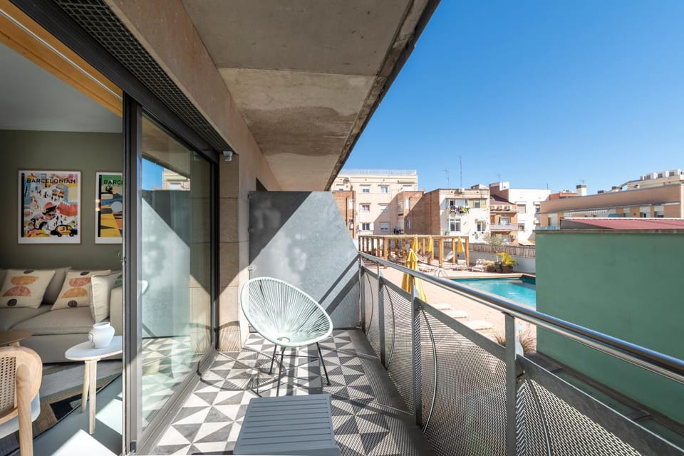 Property building, Patio, Day, View (from property/room), Balcony/Terrace, City view, Pool view, Swimming pool