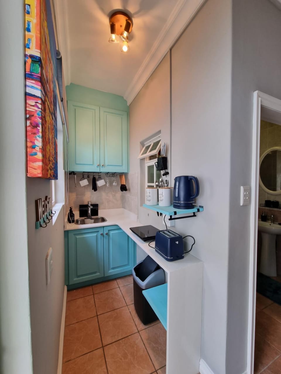 Kitchen or kitchenette, stove