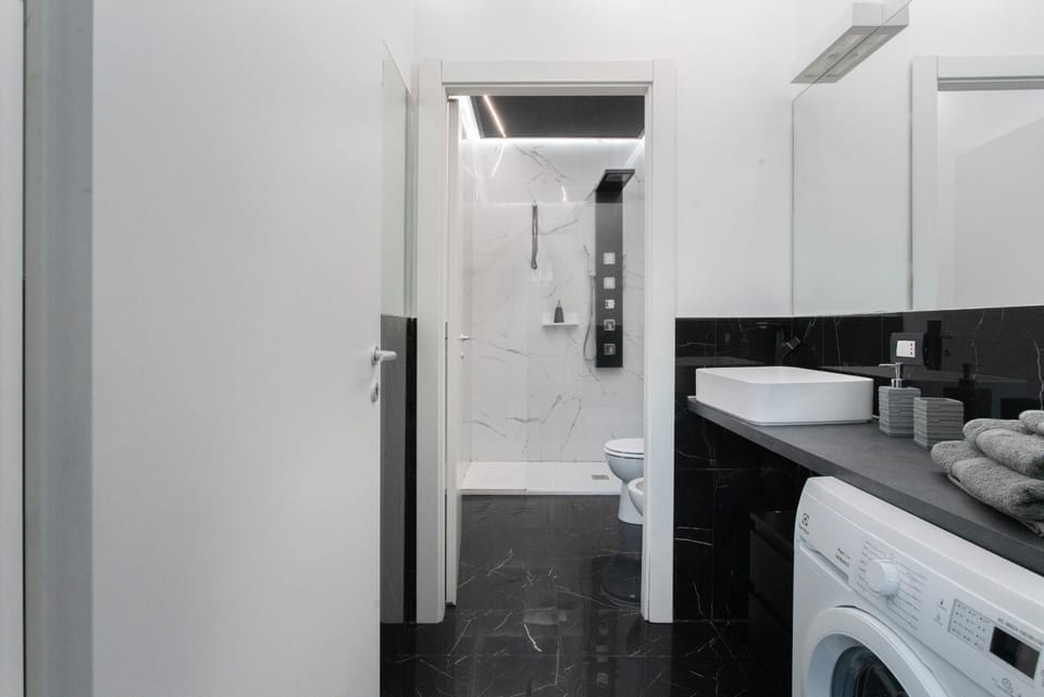 Bathroom, towels, washing machine