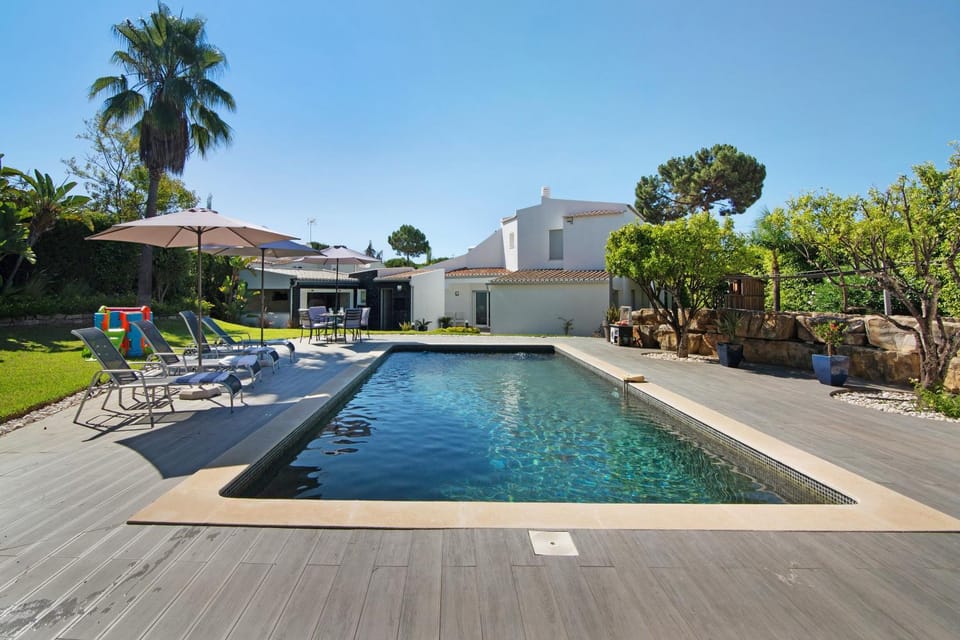 Property building, Living room, Swimming pool