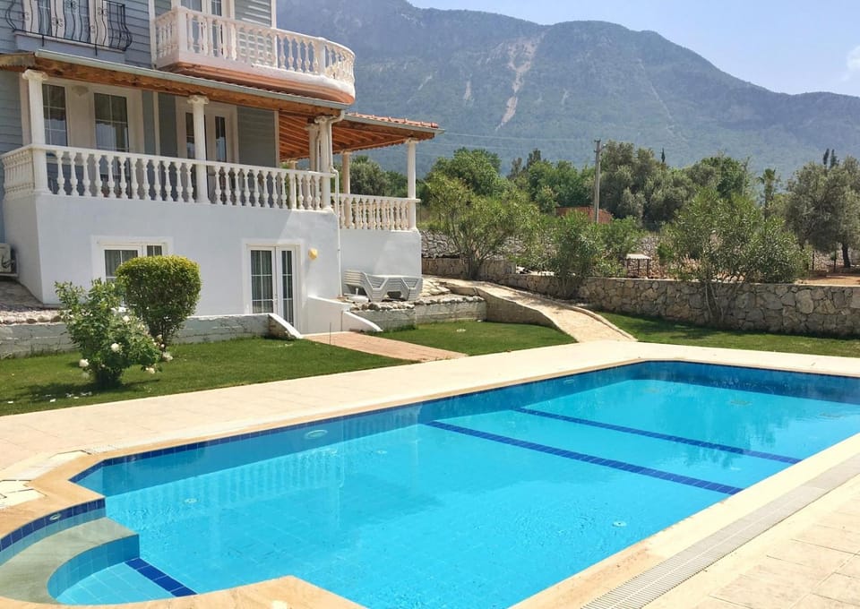 Property building, Nearby landmark, Day, Natural landscape, Mountain view, Pool view, Swimming pool, sunbed