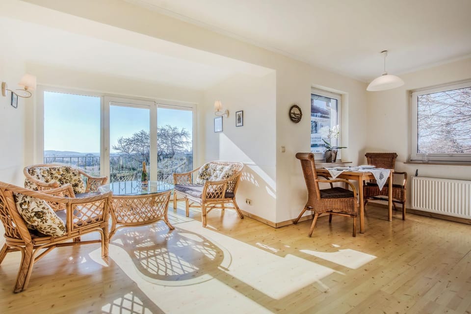 View (from property/room), Living room, Seating area, Dining area, Sea view
