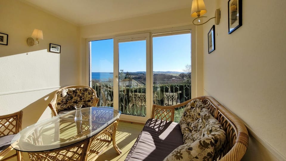 View (from property/room), Living room, Seating area, Sea view