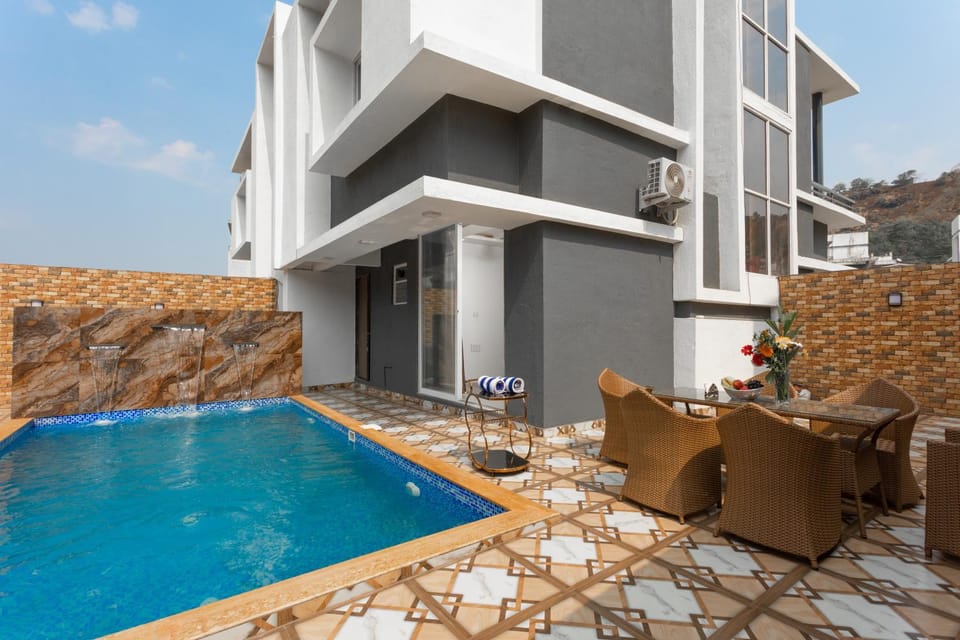 Property building, Seating area, Swimming pool, Swimming pool