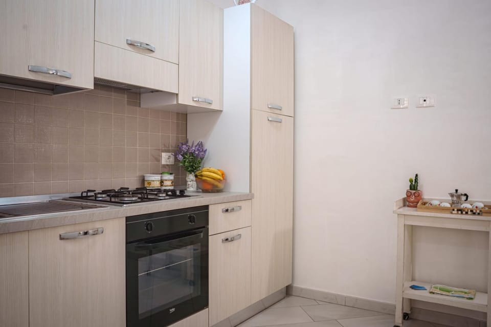 Kitchen or kitchenette, oven, stove