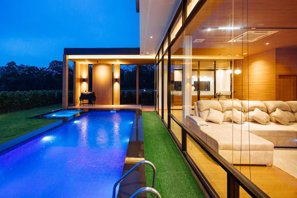 Patio, Night, Living room, Seating area, Pool view, Swimming pool, Swimming pool, sunbed