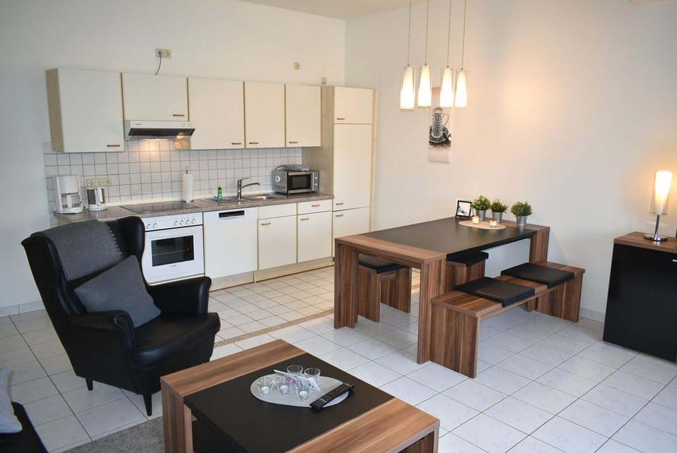 Kitchen or kitchenette, Living room, Seating area, Dining area