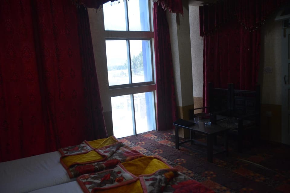 Bed, Seating area, Bedroom