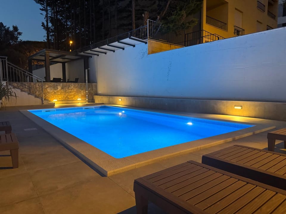 Night, Pool view, Swimming pool, sunbed