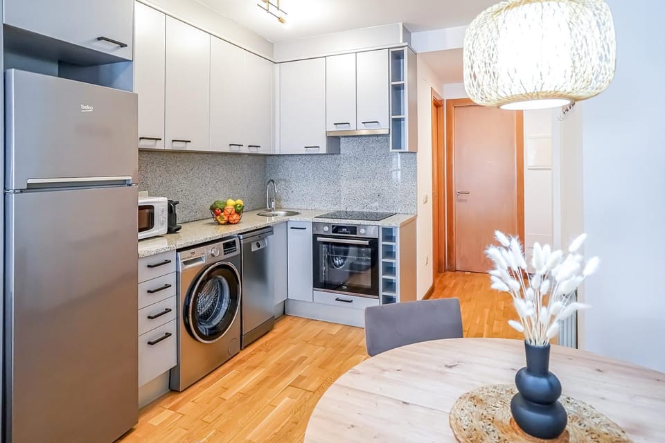 Kitchen or kitchenette, Dining area, dishwasher, oven, washing machine