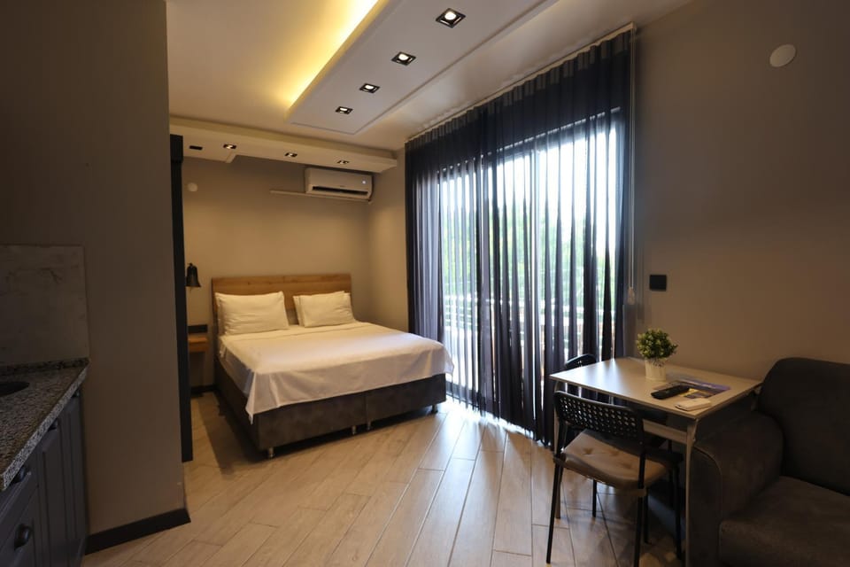 Bed, Photo of the whole room, Seating area, Bedroom, air conditioner