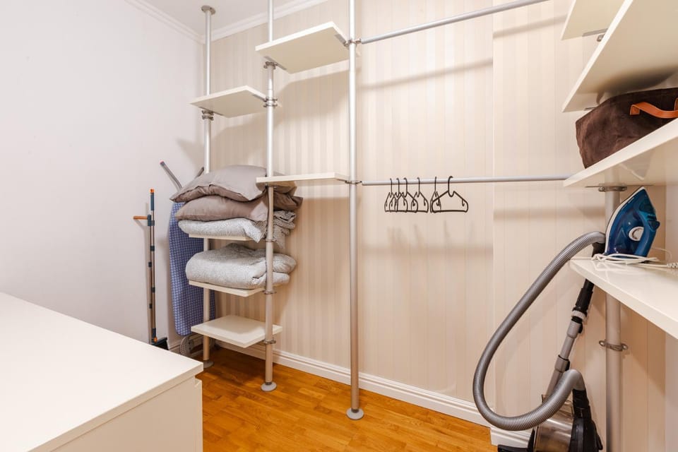 flat iron, furniture, locker, towels, wardrobe