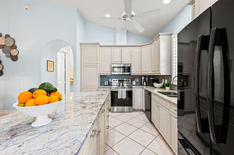 Kitchen or kitchenette, dishwasher, oven, stove, toaster