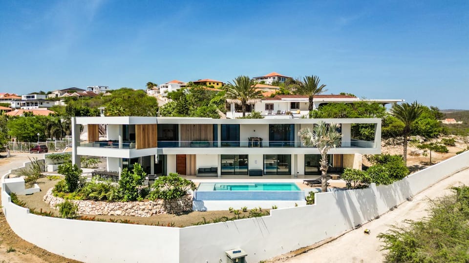 Property building, Day, Natural landscape, Pool view, Swimming pool, sunbed