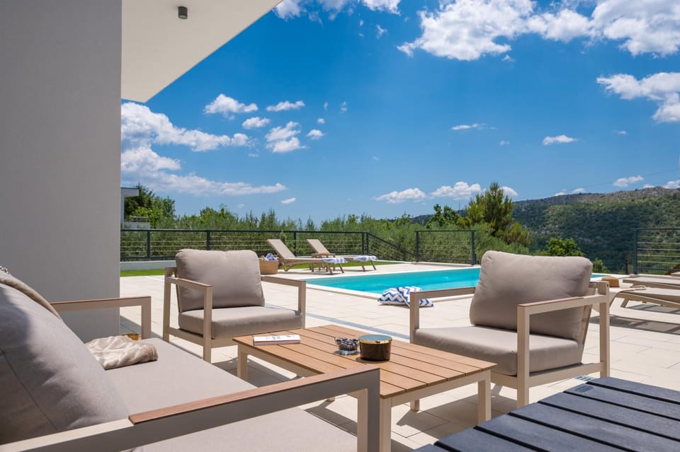 Patio, Day, Natural landscape, Mountain view, Pool view, Swimming pool, sunbed