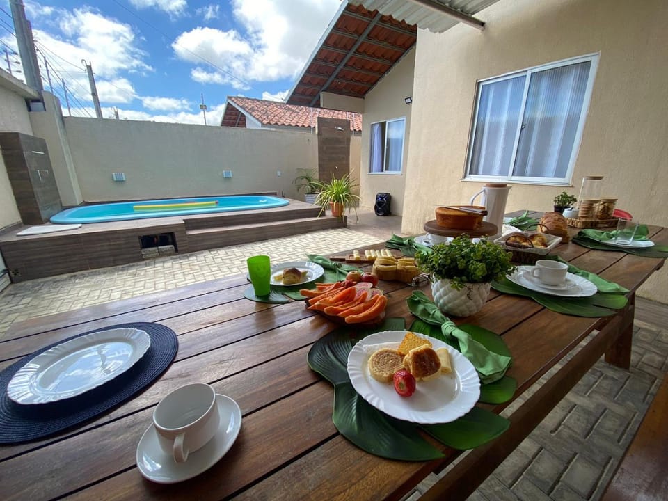 View (from property/room), Dining area, Food, Pool view, Swimming pool, Breakfast, Continental breakfast