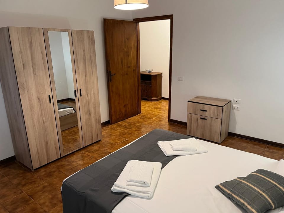 Bed, Photo of the whole room, Bedroom, towels, wardrobe