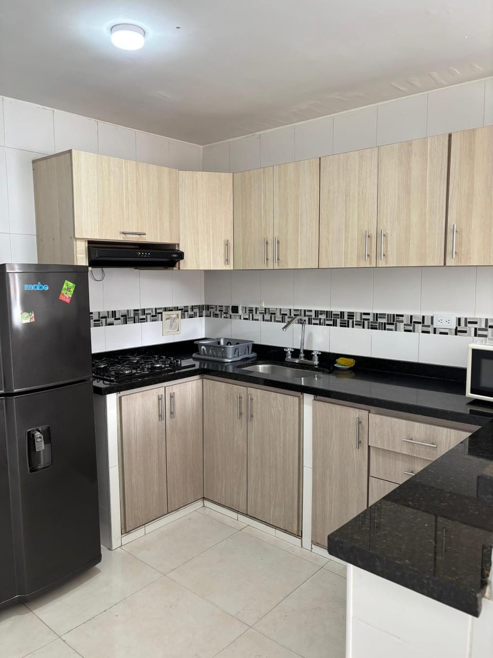 Kitchen or kitchenette, dishwasher, stove