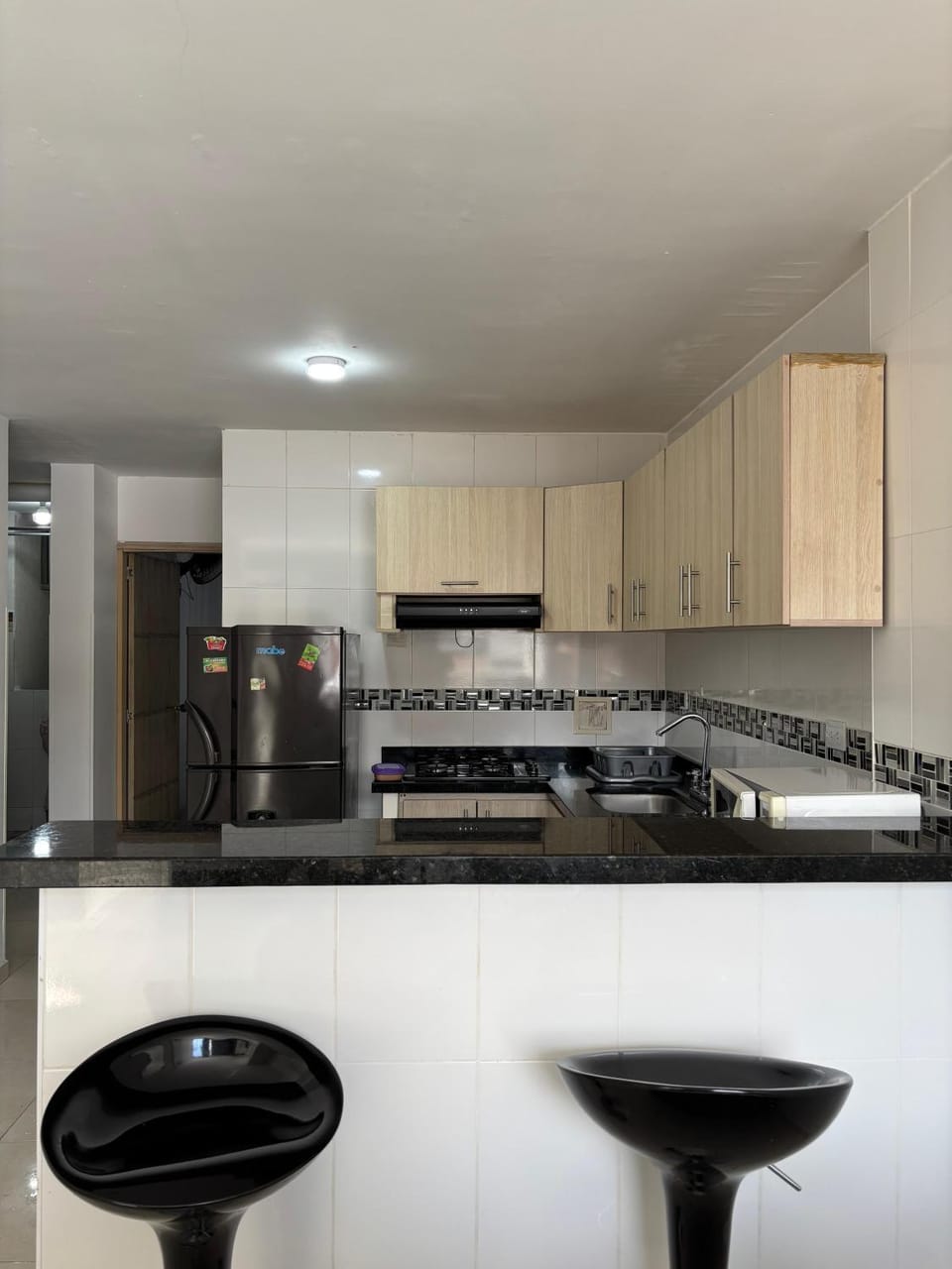 Kitchen or kitchenette, dishwasher, stove