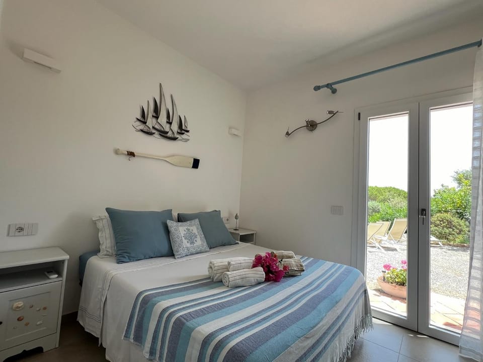 Property building, Bedroom, towels, wardrobe, air conditioner