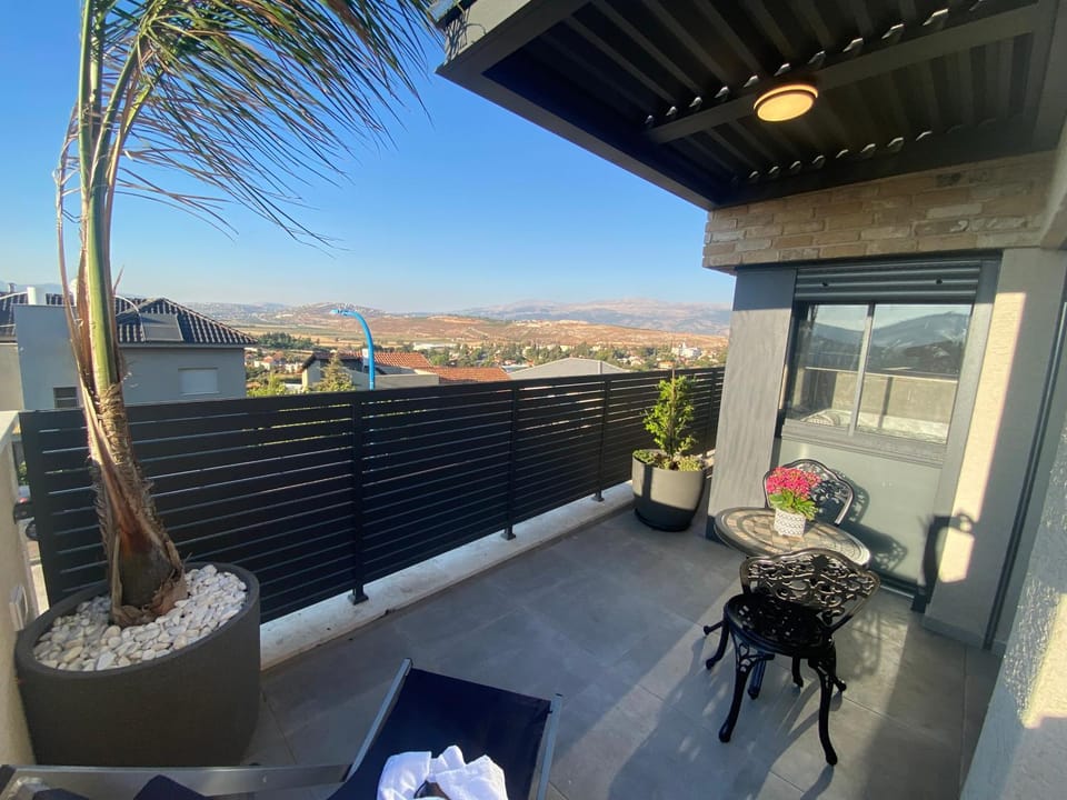 Property building, Patio, View (from property/room), Balcony/Terrace, Dining area, Mountain view
