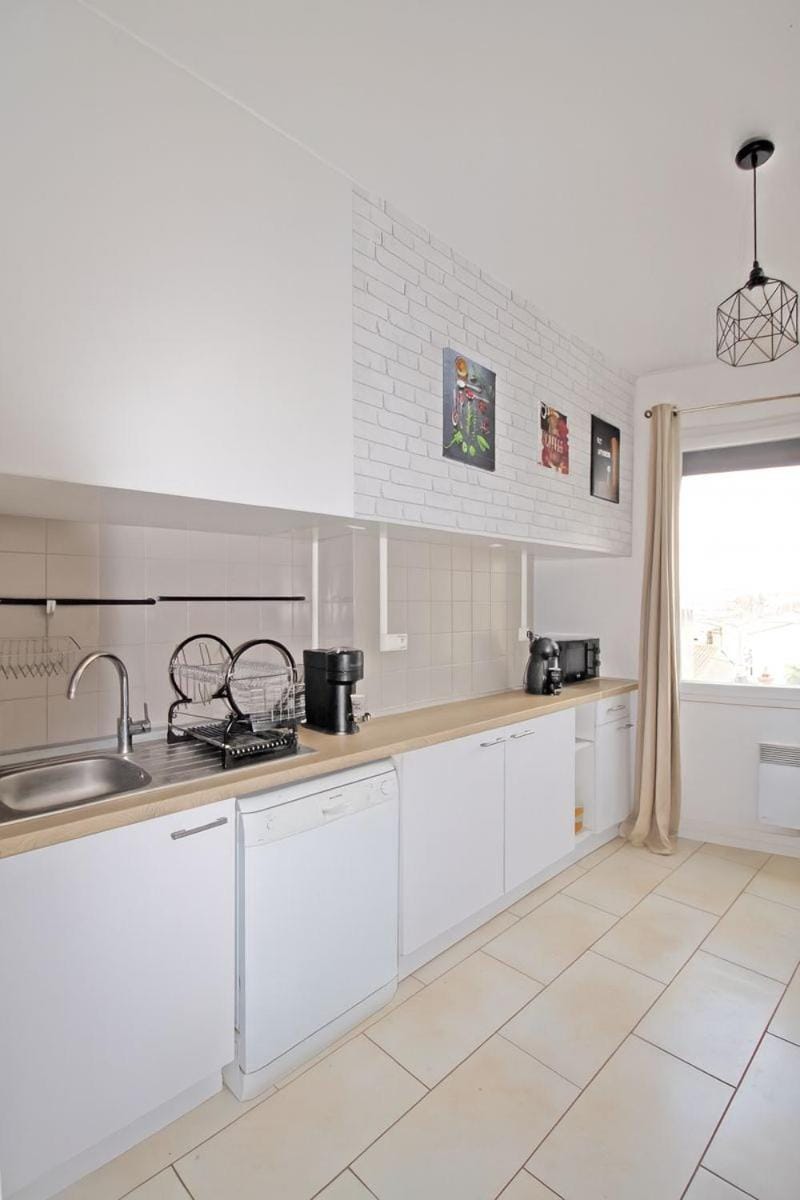 Kitchen or kitchenette, dishwasher, stove, toaster