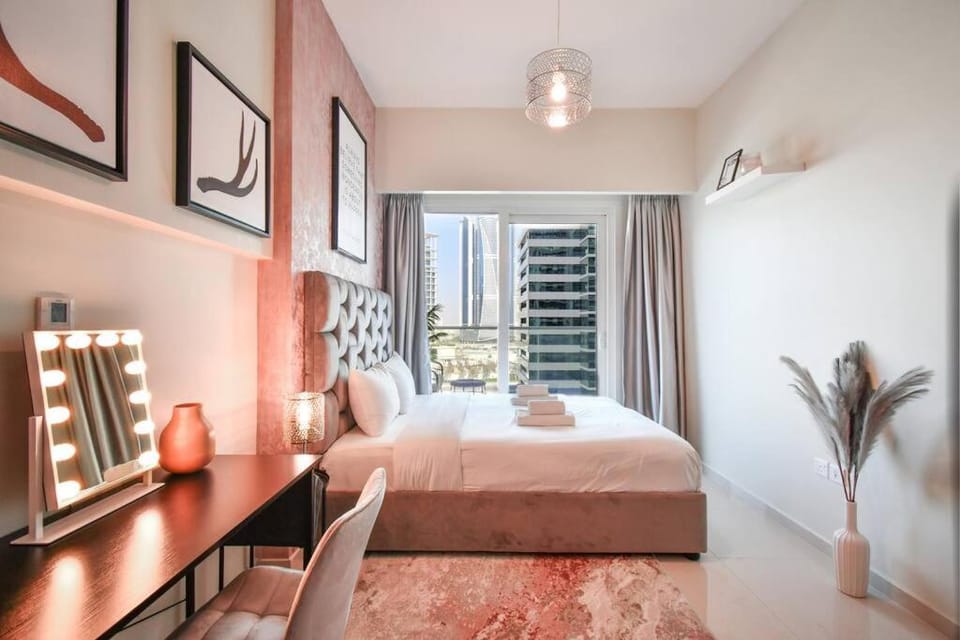 Reva tower- 2BR Dubai mall walking & canal facing Apartment in Dubai